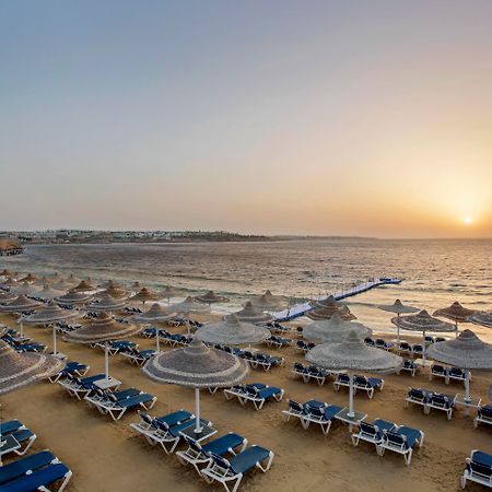 Sultan Gardens Resort Sharm El-Sheikh Exterior foto Sunset at Nissi Beach